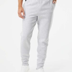 Model wearing Jerzees 975MPR joggers in ash color, front view