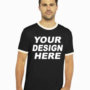 Man wearing a black custom Next Level 3604 ringer tee with white collar and sleeve trim, featuring bold placeholder text 'Your Design Here' on the front.