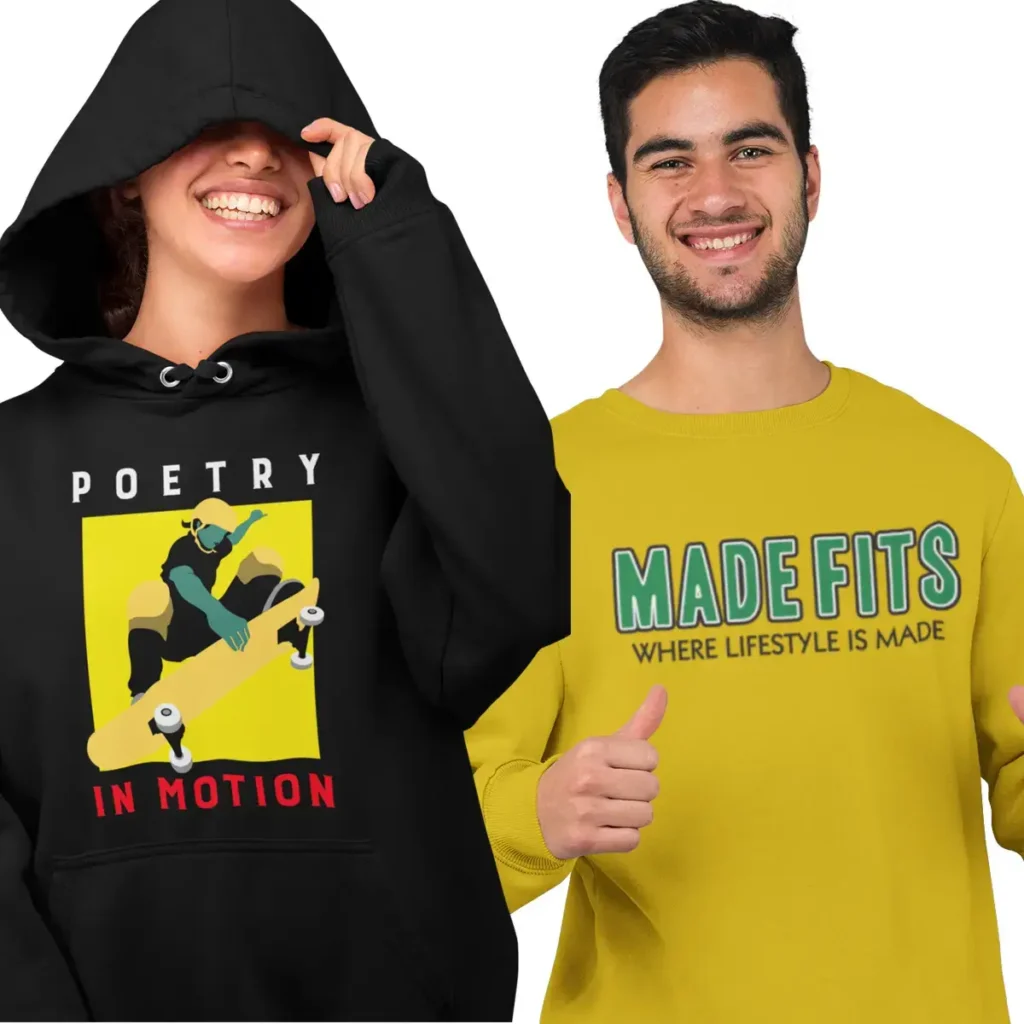 Two people wearing custom hoodies, one black with skateboard graphic and one yellow Made Fits logo sweatshirt.